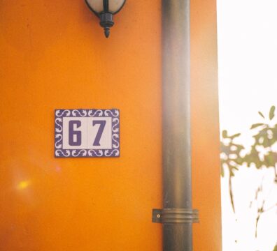 waal lamp beside a house number